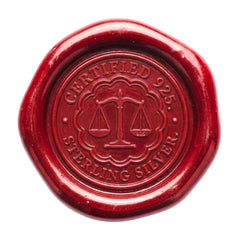 A round red wax seal with embossed text reading 'CERTIFIED 925 STERLING SILVER' and a central scale of justice emblem, shown on a plain white background.