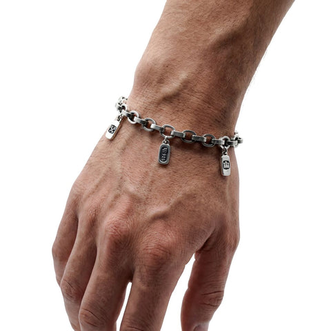 HALLMARK charm bracelet in matt 925 Sterling Silver with hallmark stamp charms by frantic studio