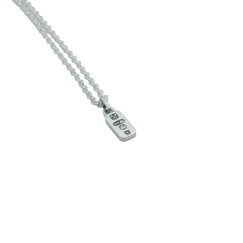 HALLMARK pendant necklace in polished 925 Sterling Silver, detail view of the hallmark pendant by frantic studio