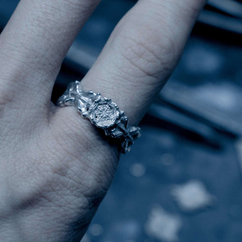 Hand-finished polished solid 925 Sterling Silver ring model OSMOSIS with a fluid organic design by frantic studio