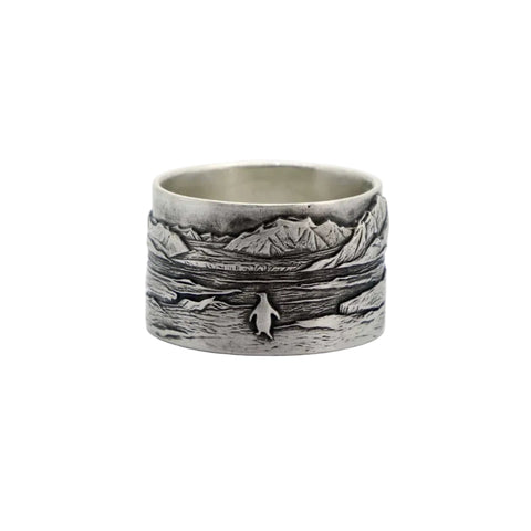 SILENT DEFECTOR ring in oxidized 925 Sterling Silver with solitary penguin motif by frantic studio