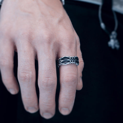 Hand-finished oxidized solid 925 Sterling Silver ring model PHALANX with a bold architectural design by frantic studio