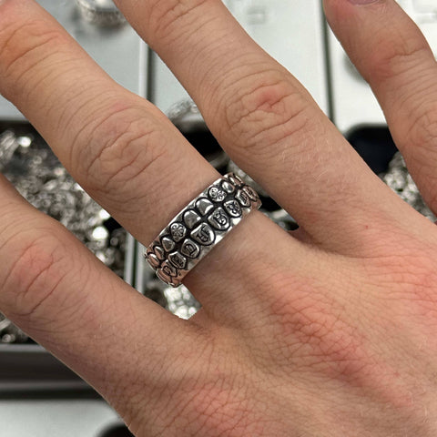 Highly detailed 925 Sterling Silver BITE ring featuring a realistic teeth motif and intricate Old English gothic text engravings with a polished finish by frantic studio