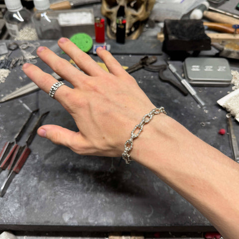 Hand-finished detailed solid 925 Sterling Silver bracelet model FUGAX VITA with an intricate polished design by frantic studio