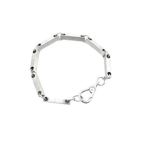 Hand-finished industrial design 925 Sterling Silver bracelet model FUNDAMENTAL featuring a muted matte finish and architectural elements designed for layering by frantic studio