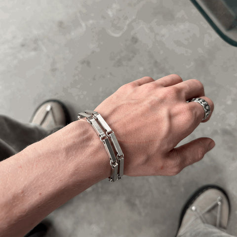 Hand-finished industrial design 925 Sterling Silver bracelet model FUNDAMENTAL featuring a muted matte finish and architectural elements designed for layering by frantic studio