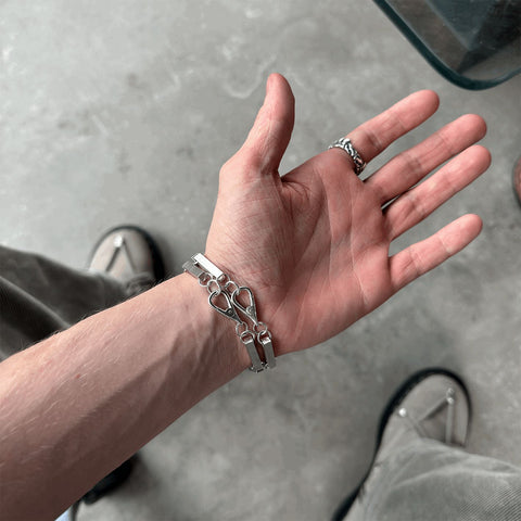 Hand-finished industrial design 925 Sterling Silver bracelet model FUNDAMENTAL featuring a muted matte finish and architectural elements designed for layering by frantic studio