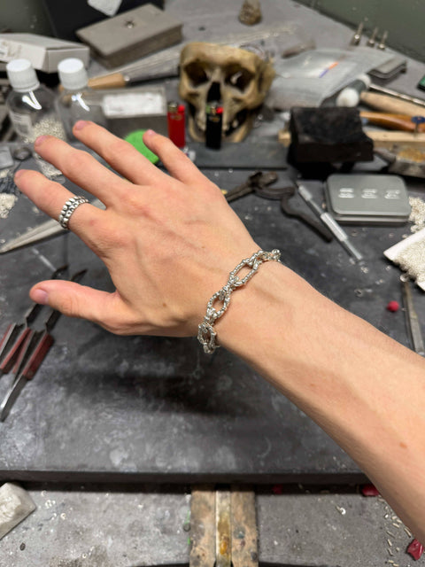 Hand-finished massive 925 Sterling Silver bracelet model IRREPARIBLE TEMPUS with highly detailed intricate elements in a polished finish by frantic studio