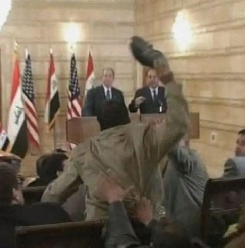 The "Farewell Kiss" Ring - Handcrafted in oxidized 925 sterling silver. - A tribute to the most famous shoe ever thrown at George W. Bush. FRANTIC STUDIO 